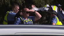 Mount Lawley Senior High School students claiming they were told to hide under desks, as the video spread online but parents say they weren't told about the threat.