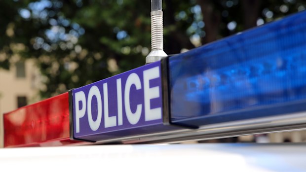 A man wanted for shooting at police set up a camp in bushland while on the run and was routinely visited by his partner, an inquest into his death been told.