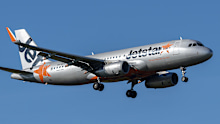 Auckland, New Zealand: June 28th, 2024. Jetstar Airbus A320 landing in Auckland International Airport.