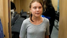 Climate activist Greta Thunberg leaves a court room after a hearing in Malmö, Sweden.