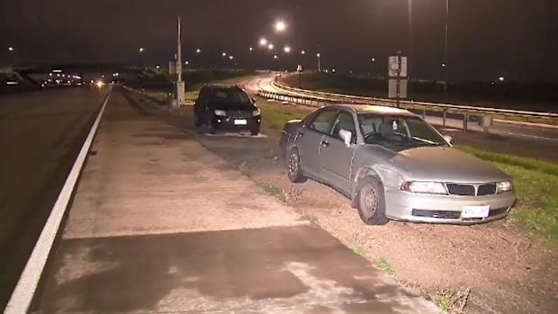 An alleged drink driver has crashed into police while they were carrying out a breath test on another drink driver in Adelaide.