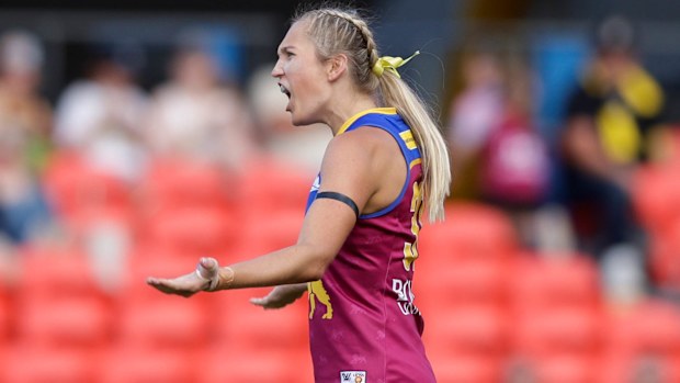 Taylor Smith of the Lions celebrates a goal.