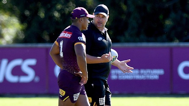 Tesi Niu gets instructions from Anthony Seibold at Broncos training.