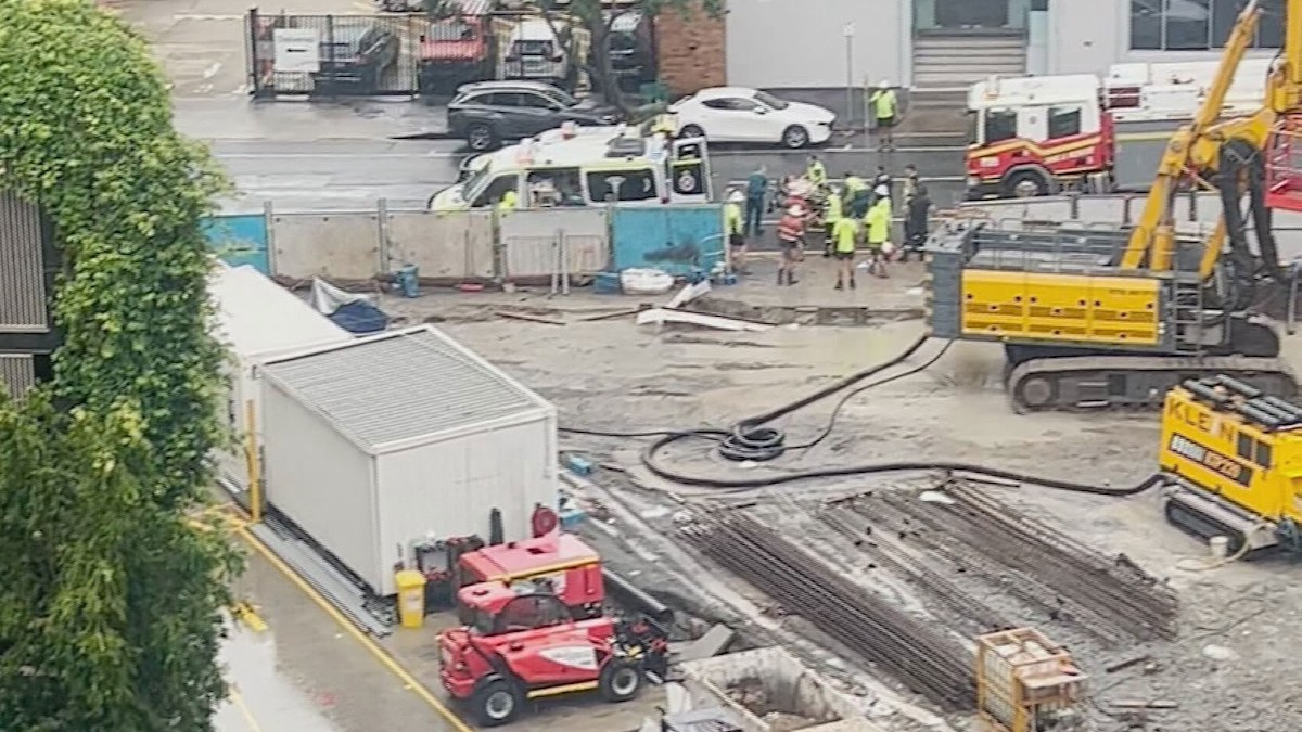 Brisbane news: Subcontractor fighting for life, another injured after ...