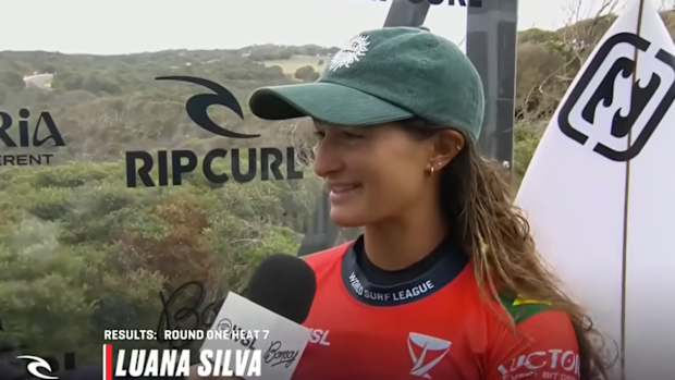 Luana Silva speaks to reporters.