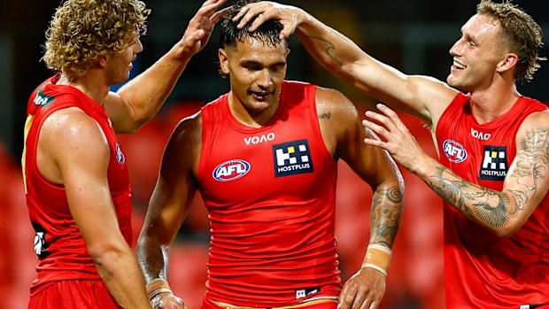 Jamarra Ugle-Hagan of the Suns celebrates a goal during pre-season.
