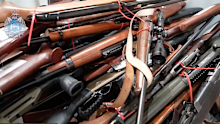 Western Australia's gun buyback program has achieved a major milestone as the state's new gun reform laws face scrutiny in the upper house. 