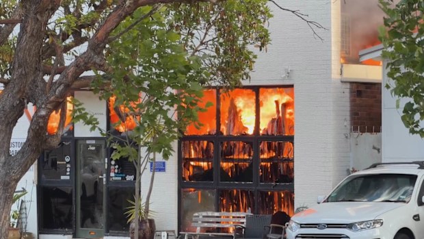 The blaze broke out less than an hour ago in Brookvale and is still burning out of control.