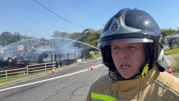 A lack of water supply and several nearby gas cylinders are threatening to worsen a destructive fire that engulfed a beloved sports club in NSW's Mid North Coast.