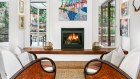 19 Sugarloaf Crescent, Castlecrag: The colonial-style family home has as its centrepiece a modern gas fire.