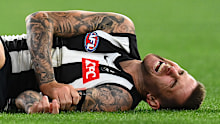 Jeremy Howe lays on the ground in pain.