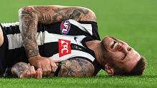 Jeremy Howe lays on the ground in pain.
