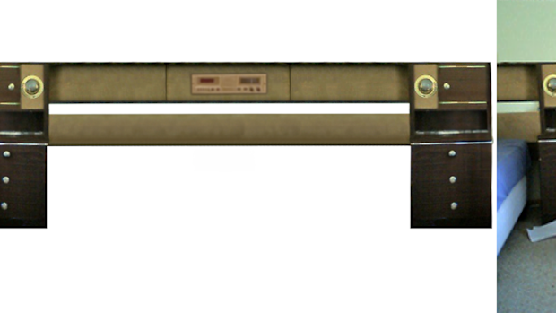 A bedframe with built in radio and lights.