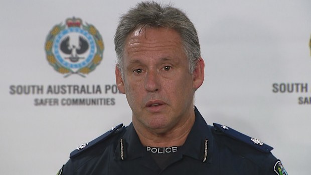 Police are searching for someone "actively harming the public" after wires were strung up across a popular bike path in Adelaide, tripping and injuring unassuming cyclists.