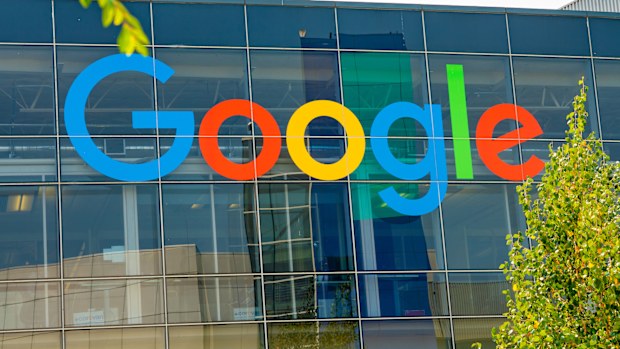 Palo Alto, California, USA - January 02, 2018: Googleplex office in Silicon Valley. Huge Google sign, Android robot sculpture and main Google office.