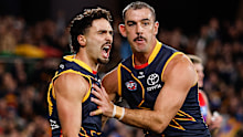 Izak Rankine (left) and Taylor Walker.