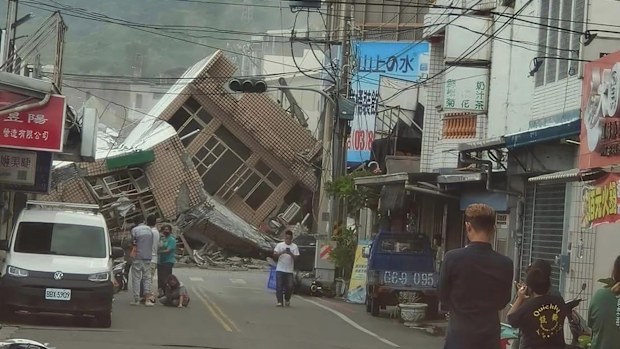 This image shows a collapsed building in southern Taiwan following a powerful earthquake on Sunday.