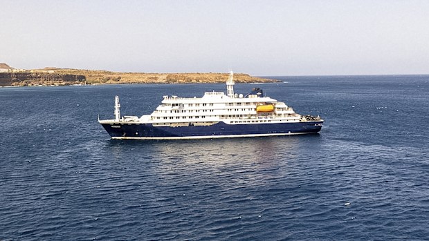 The cruise ship MV Hondius stationary off the port of Praia, the capital of Cape Verde, on May 3, 2025. An outbreak of "severe acute respiratory illness" on board a cruise ship in the Atlantic has left three people dead, a third in intensive care in Johannesburg, South Africa, and two crew members in need of urgent medical attention. The outbreak occurred on the MV Hondius, travelling from Ushuaia in Argentina to Cape Verde.