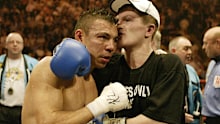 Ricky Hatton hugs Kostya Tszyu after the IBF light-welterweight match.   (Photo by Nick Potts - PA Images/PA Images via Getty Images)