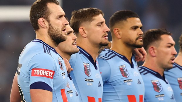 Blues players led by Isaah Yeo.