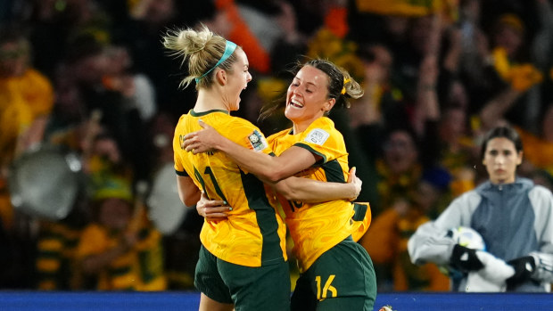Hayley Raso celebrates her goals and the Matildas' second of their 2-0 victory over Denmark.