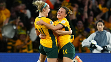 Hayley Raso celebrates her goals and the Matildas' second of their 2-0 victory over Denmark.