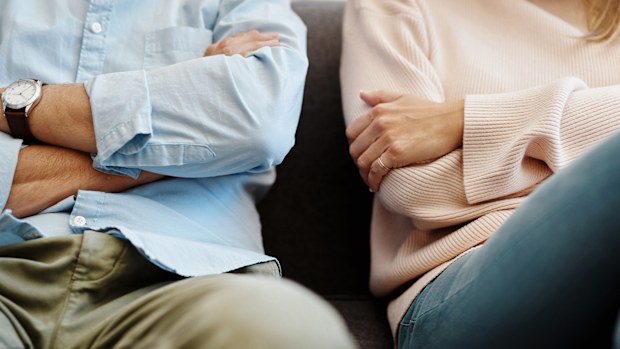 Cropped shot of a couple having a disagreement at home