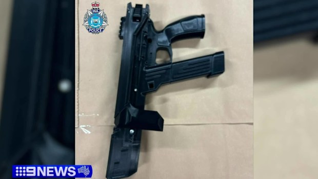 A man has been charged after police allegedly found 21 home-made 3D-printed guns along with drugs and cash in a raid of a Perth home.