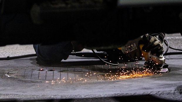 Loose manhole covers were repaired ahead of the F1 Grand Prix of Las Vegas.