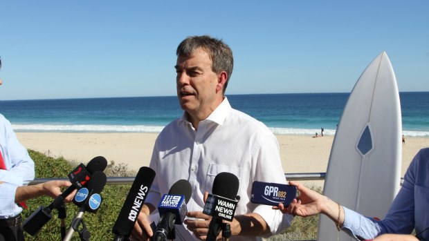 Fisheries Minster Dave Kelly is calling on the NSW state government to release the final report of research into shark deterrent devices.