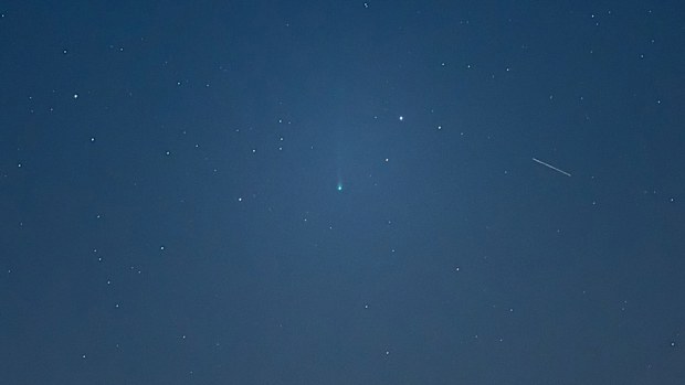 Comet Nishimura can bee seen as a faint green dot in the sky over L'Aquila, Italy, on September 7.