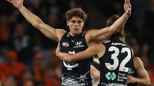 Charlie Curnow celebrates a goal.