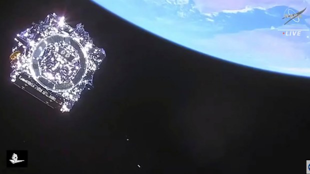 This photo provided by NASA, the James Webb Space Telescope is separated in space on Saturday, Dec. 25, 2021.  NASA's James Webb Space Telescope soared from French Guiana on South Americas northeastern coast, riding a European Ariane rocket into the Christmas morning sky.  The $10 billion infrared observatory is intended as the successor to the aging Hubble Space Telescope. (NASA via AP)