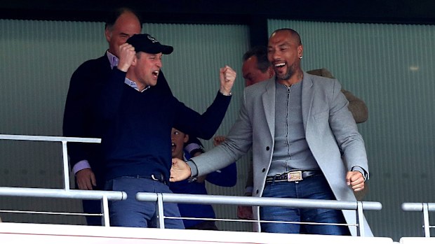 Prince William reacts with joy as Aston Villa is promoted to Premier League