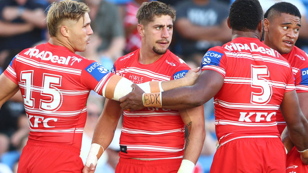 Zac Lomax of the Dragons celebrates a try during the round six match against the Titans.