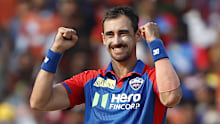 Delhi Capitals' Mitchell Starc celebrates the wicket of Sunrisers Hyderabad's Ishan Kishan during the Indian Premier League cricket match between Delhi Capitals and Sunrisers Hyderabad at ACAVDCA Cricket Stadium in Visakhapatnam, India, Sunday, March 30, 2025. (AP Photo/Surjeet Yadav)