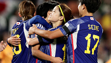 Japan's Riko Ueki celebrates scoring their fifth goal against Zambia.