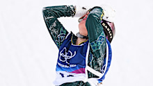 Australia's Ally Hickman reacts after crashing during the women's snowboarding slopestyle finals at the 2026 Winter Olympics, in Livigno, Italy, Wednesday, Feb. 18, 2026. (AP Photo/Lindsey Wasson)