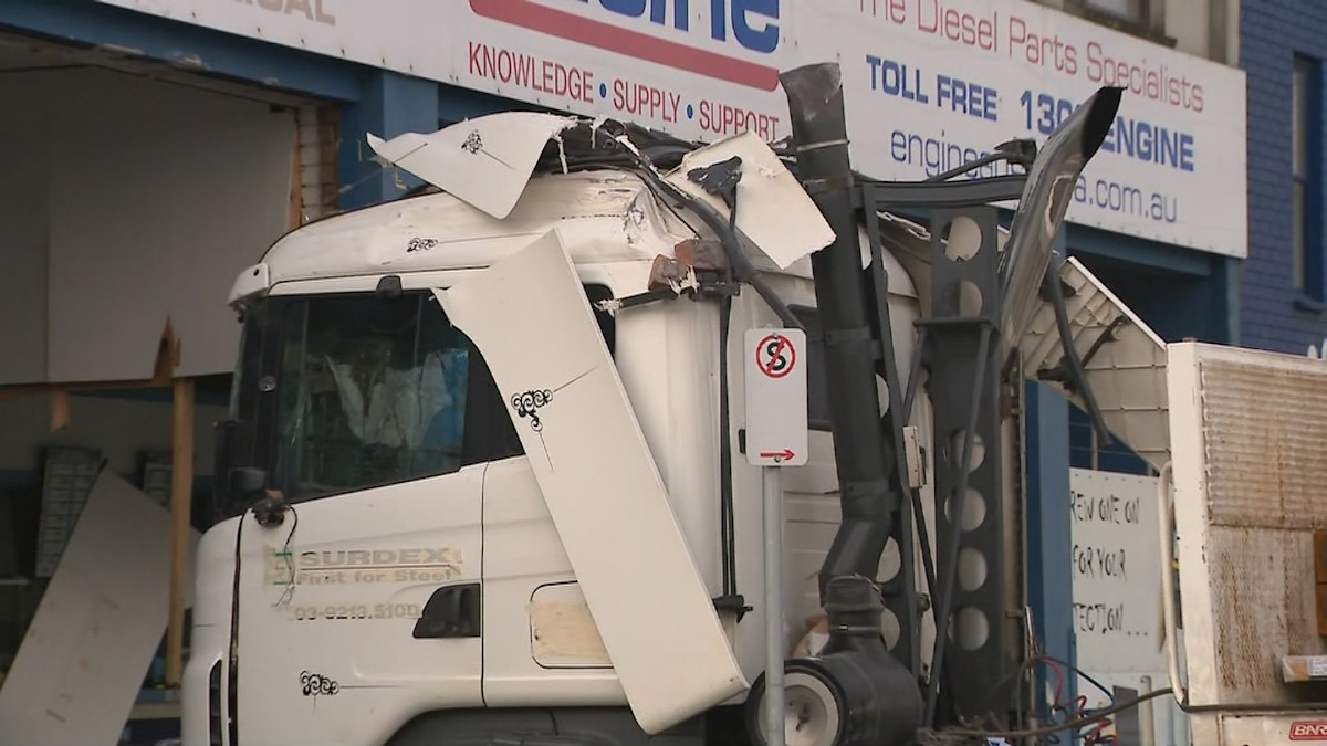 Dandenong news: Driver rescued after truck ploughs through two-storey ...