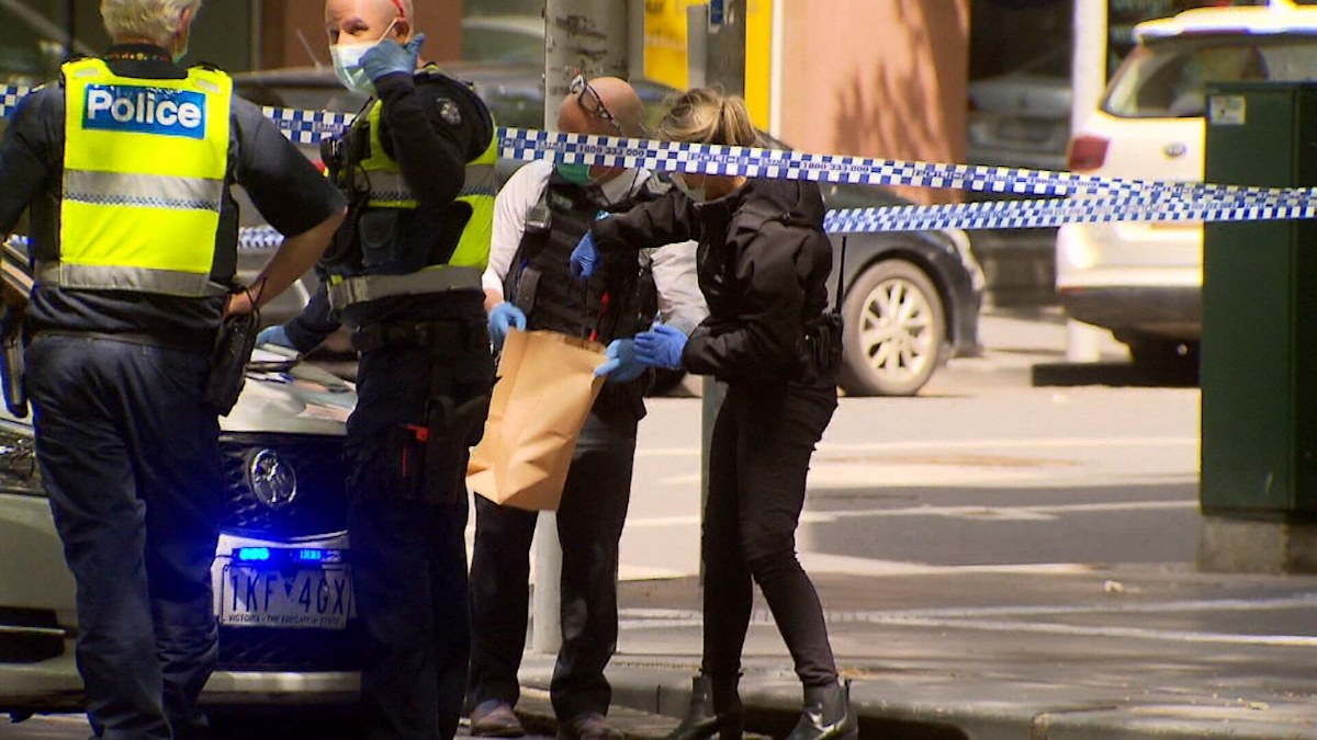 Melbourne stabbing man fights for life woman arrested | Nine.com.au