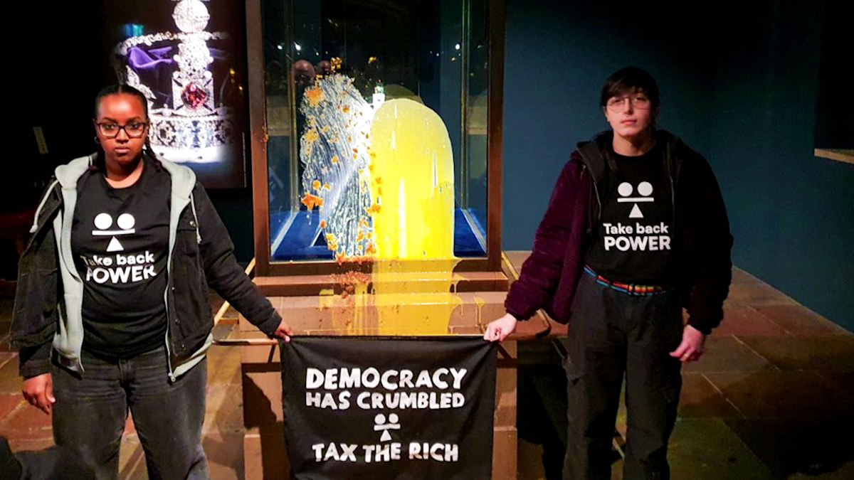 Protesters arrested after smearing custard and crumble on Crown Jewels case