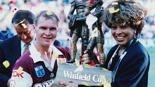 Tina Turner and Brisbane Broncos captain Alfie Langer after the 1993 NRL grand final.