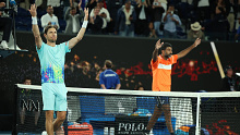 MELBOURNE, AUSTRALIA - JANUARY 27: Matthew Ebden of Australia and Rohan Bopanna of India celebrate winning championship point in their Mens Doubles Final match against Simone Bolelli and Andrea Vavassori of Italy during the 2024 Australian Open at Melbourne Park on January 27, 2024 in Melbourne, Australia. (Photo by Daniel Pockett/Getty Images)