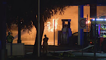More than 50 firefighters are at the scene of a service station blaze at Fairfield in Sydney's west.