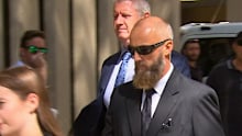 Former policeman Adrian Trevor Moore has faced a Perth court charged with more than 100 offences.