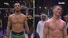 Paul Hughes was unhappy over the decision loss to Usman Nurmagomedov (L)