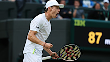 Alex De Minaur roars after a big point against Jack Draper.