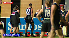 Charlie Dixon limps off the field at Port Adelaide training. 