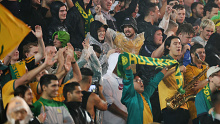 Socceroos fans at Stadium Australia on Thursday.