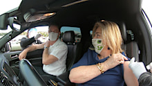 Rob Penfold with his wife Shar getting the COVID-19 jab in the Los Angeles Dodgers baseball stadium, which has been converted into America's largest drive-through vaccination clinic.  